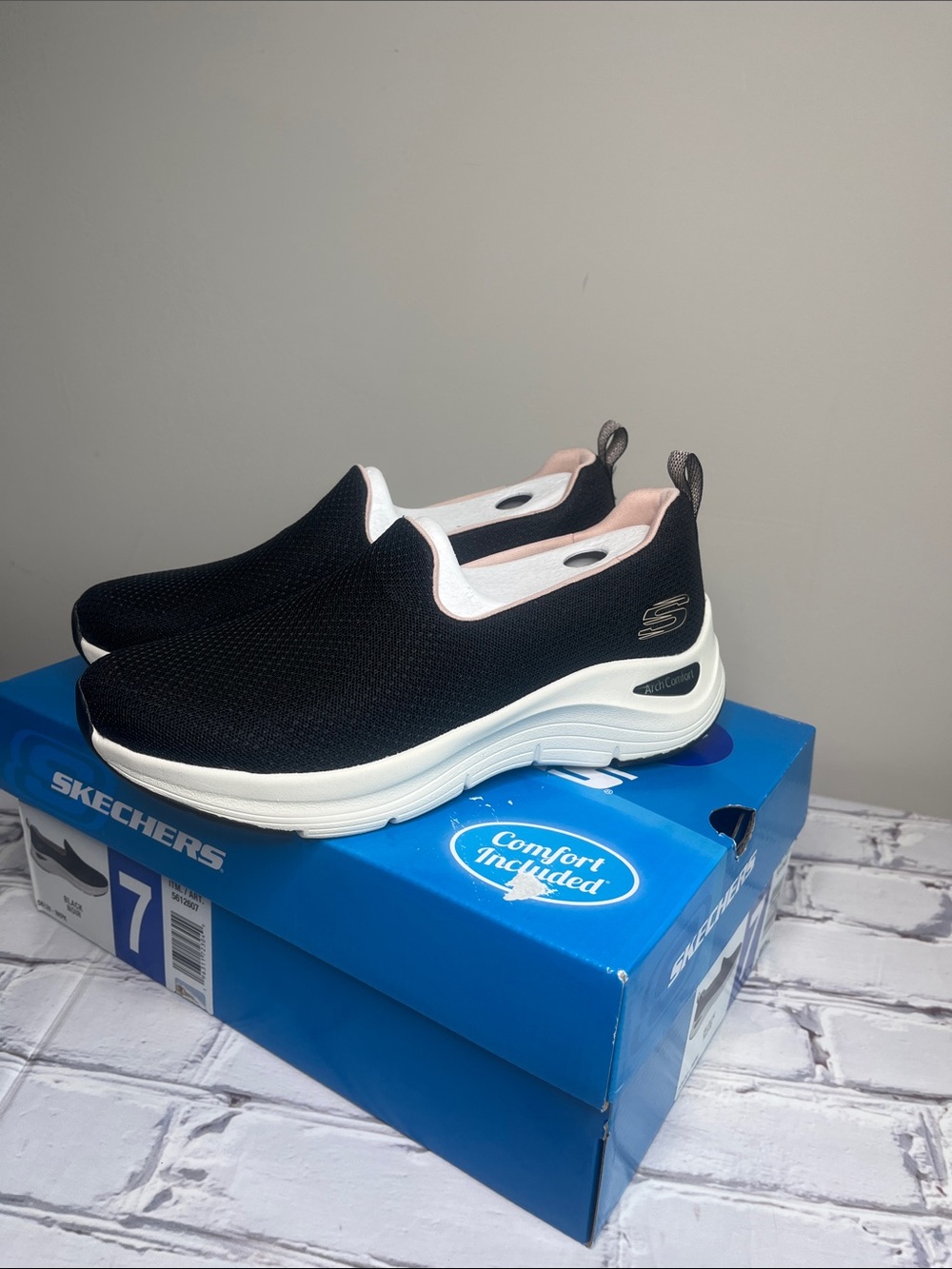Skechers Black Slip-On Sneakers with White Platform and Pink Lining